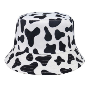 Black and white Fishman hat with cow pattern