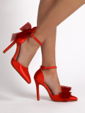 Shallow mouth, high heels, bow