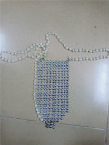 Pearl, hanging neck, suit