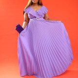 Long skirt with belt, ruffle and pleated hem