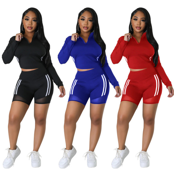 Casual long sleeved top paired with fashionable hip lifting shorts casual set