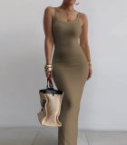 Slim fitting and tight fitting long skirt with straps