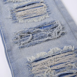 High waisted jeans with a distressed edge design