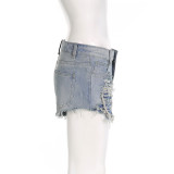 High waisted jeans with a distressed edge design