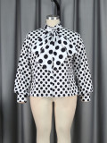 Long sleeved black and white polka dot top with collar