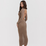 Knitted women's half high neck dress with a tight fitting and backless long skirt