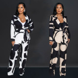 Two piece suit with printed straps long sleeved pants