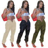 Solid color navel exposed casual pants with zippered pockets on both sides