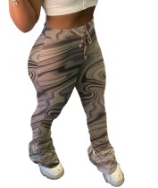 Pantaloni colorati con fessura laterale a vita alta con stampa africana