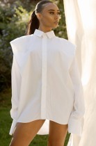 Blusa suelta alta baja casual de manga larga blanca de otoño