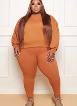 Conjunto de pantalones pitillo y sudadera con cuello redondo y manga larga suelta naranja de talla grande de otoño