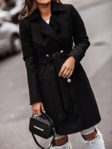 Cappotto lungo elegante invernale con colletto alla rovescia nero con cintura abbinata