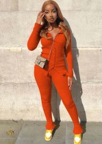 Winter-lässiges orangefarbenes Lätzchen-Strickhemd und passendes Hosen-Set