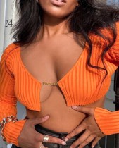 Top corto a maniche lunghe con catena a coste arancione sexy autunnale