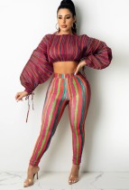 Conjunto de dos piezas de pantalón y top corto de rayas multicolores con estampado de fiesta de otoño
