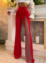 Pantaloni svasati rossi eleganti a vita alta in rete autunnale