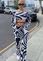 Autunno Sexy bianco e nero stampato con spalle scoperte e pantaloni abbinati Abbigliamento a due pezzi all'ingrosso