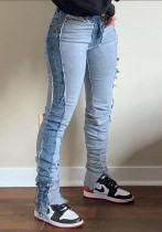Wintermode Hellblaue Slim Jeans mit Kontraststreifen