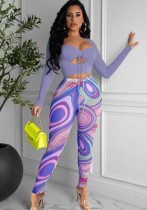 Set di due pezzi con top corto trasparente sexy primaverile e stampa legging