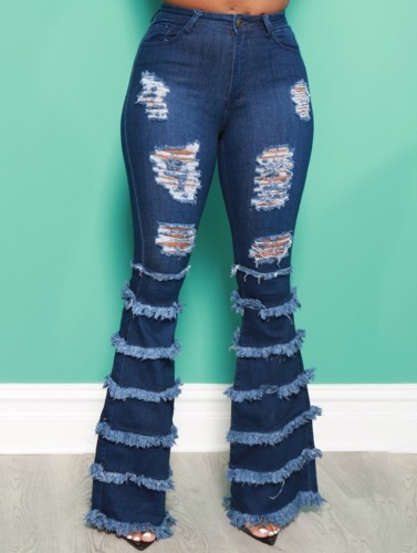 Lentemode Dk-blauwe hoge taille gescheurde lagen jeans met kwastjes