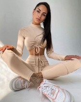 Primavera all'ingrosso abbigliamento yoga beige cravatta a maniche lunghe crop top e pantalone in due pezzi