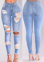 Jeans elásticos de alta cintura rasgados azul claro de moda de primavera