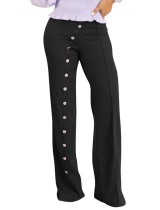 Pantalón de cintura alta con diseño de botón negro de moda de primavera