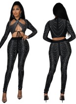 Vrouwen lente zwarte kralen crop top en broek sexy tweedelige set