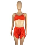 Großhandel Sportswear Sommer Orange Rüschen Weste und unregelmäßige Shorts Zweiteiliges Set
