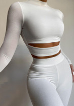 Großhandel Sportswear Weiß Rundhalsausschnitt Langarm Top und Hose Zweiteiler Set