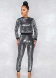 Damen Frühling Schwarz Mode O-Ausschnitt Lange Ärmel Glänzendes Top und Hose Großhandel 2 Stück Sets