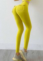Pantalones de yoga con bolsillos sólidos de cintura alta de color amarillo primavera para mujer