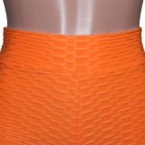 Pantaloncini da yoga solidi a vita alta a maniche corte arancioni da donna