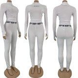 Conjunto de dos piezas de top y pantalón con estampado de letras ajustadas de manga larga para mujer