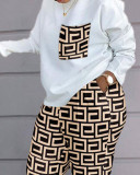 Conjunto de blusa e calça com estampa xadrez feminina