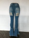 Jeans svasati in denim strappati vintage