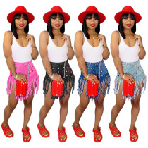 Pantalones cortos de mezclilla con flecos Pantalones cortos de mezclilla informales de color para mujer
