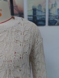 Otoño e invierno tejido color sólido gancho flor hueco jersey cuello redondo suelto mujer suéter