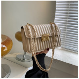 Le petit sac populaire de cette année, le sac de messager à chaîne all-match pour femmes, petit sac carré texturé de haute qualité