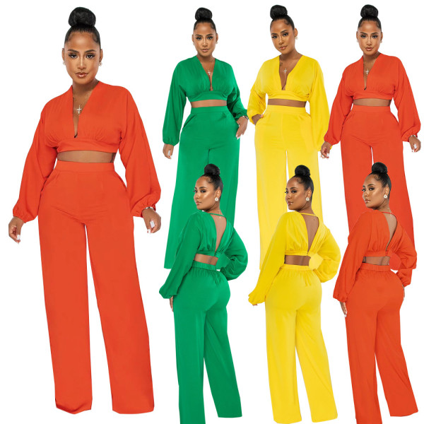 Costume de mode de couleur unie fendu à col en V et dos ouvert pour femmes