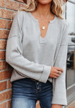 Camisa de punto con cuello en V de color sólido para mujer Suéter de manga larga para otoño e invierno