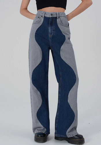 Pantalones rectos de mezclilla ondulada de color de contraste de tendencias de mujer