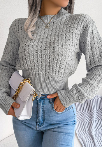 Suéter de punto corto de manga larga torcido de estilo callejero de otoño/invierno