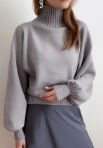 Suéter casual de moda con cuello alto y mangas abullonadas de color liso para otoño e invierno para mujer