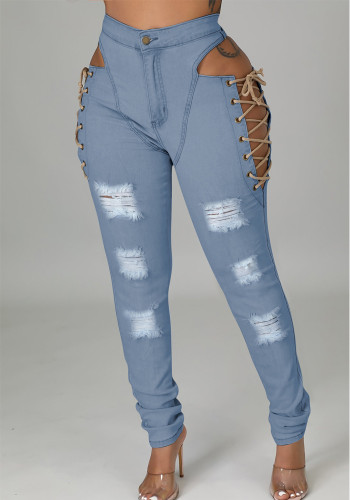 Calça jeans rasgada feminina com cadarço