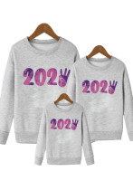 Conjunto familiar para padres e hijos, moda informal holgada a la moda, jersey de cuello redondo con estampado 2023, sudadera de manga larga a la moda