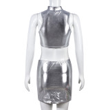 Conjunto de dos piezas de minifalda y top corto recortado de cuero sintético elástico para mujer