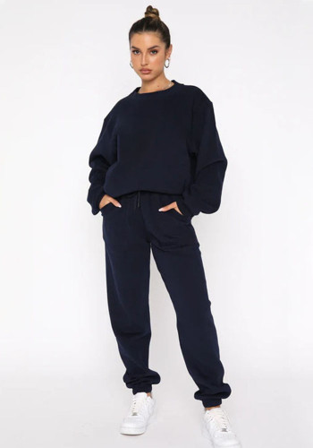 Conjunto de pantalones casuales de moda con capucha de manga larga con cuello redondo y forro polar de color sólido
