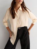 Blusa de mujer de carrera Camisa de manga larga elegante suelta elegante de color sólido