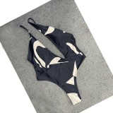 sexy estampado simple ahuecado hacia fuera hombro inclinado traje de baño bikini de una pieza